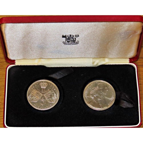 487 - A mixed collection of Royal Mint cased commemorative / collectable coins, to include seven United Ki... 