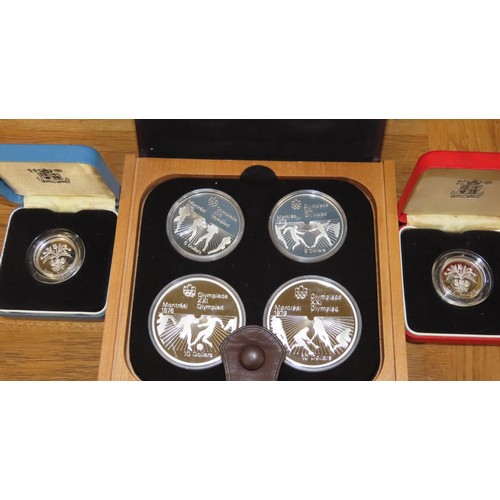 488 - A collection of collectable / commemorative coin sets to include Royal Mint Coinage of Great Britain... 