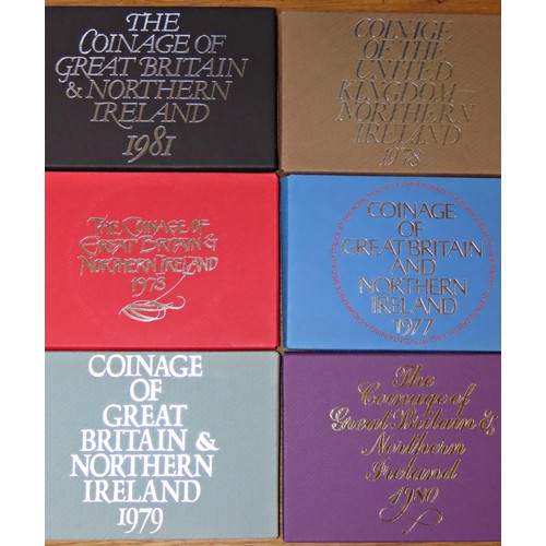 488 - A collection of collectable / commemorative coin sets to include Royal Mint Coinage of Great Britain... 