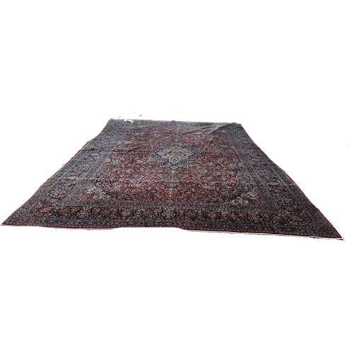 1701 - A Kashan country house carpet with an all over floral pattern 420cm x 310cm approximately