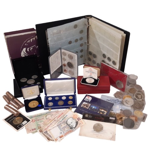 403 - A coin album containing various coins, fantasy Edward VIII coin set, other coin sets, commemorative ... 