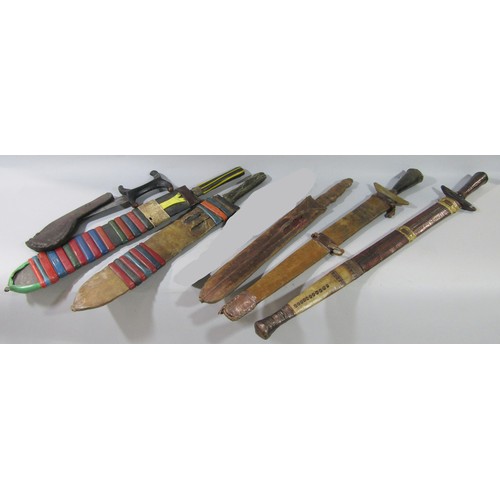 709 - Two African Tuareg Telek dagger -swords and five other dagger-swords mainly African (7)