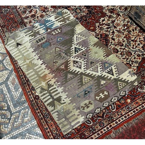 1695 - Three small old Persian rugs, two old kilims, all worn and torn in places, (as found)