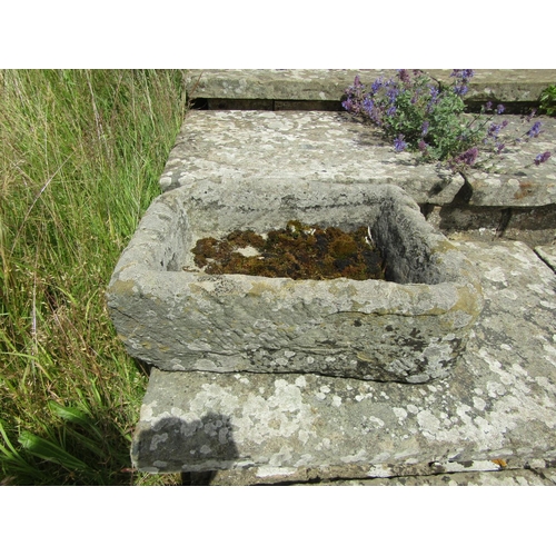 1084 - A small weathered natural stone planter / trough of rectangular form,  23cm high, 55 x 46cm.