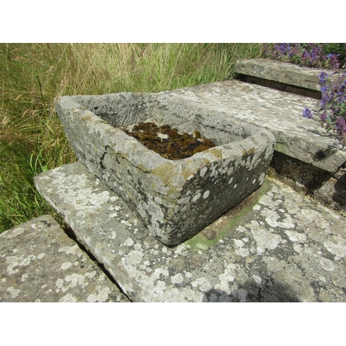 1084 - A small weathered natural stone planter / trough of rectangular form,  23cm high, 55 x 46cm.