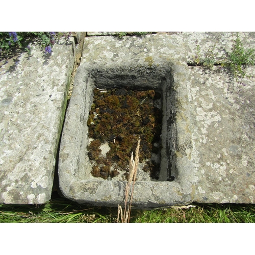 1084 - A small weathered natural stone planter / trough of rectangular form,  23cm high, 55 x 46cm.