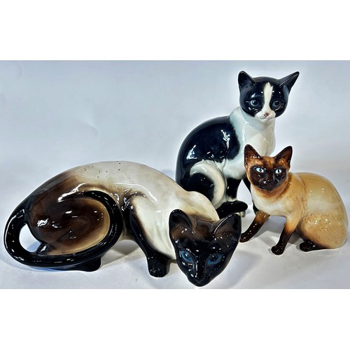 7 - Three cat figures to include one by Goebels, Sylvac, and one other, life sized (3)