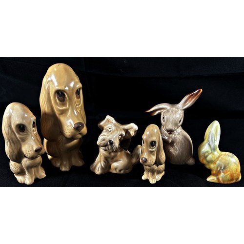 20 - A collection of Sylvac ware to include 4 dogs, 2 swans and 2 bunnies (8)