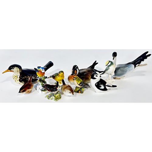 31 - a collection of Beswick, Clovelly and Russian bird figures including wrens, gold crest, blue tit (11... 