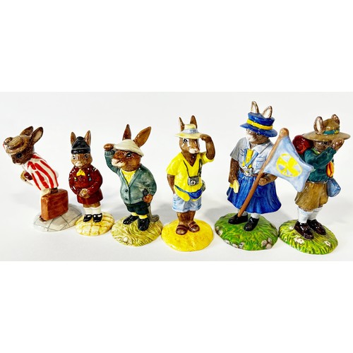 41 - A collection of Doulton Bunnykins figures in professional attire, sports, etc (21)