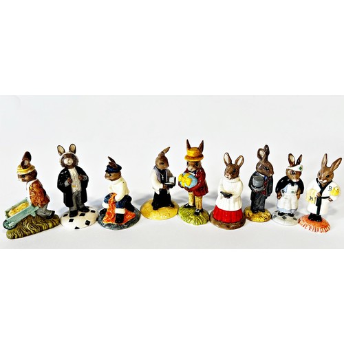 41 - A collection of Doulton Bunnykins figures in professional attire, sports, etc (21)