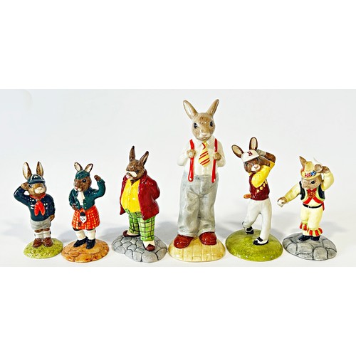 41 - A collection of Doulton Bunnykins figures in professional attire, sports, etc (21)