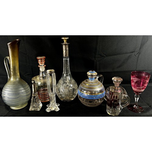 161 - A silver hooped Art Deco cocktail set with shaker, decanters, and a selection of glasses to match, t... 