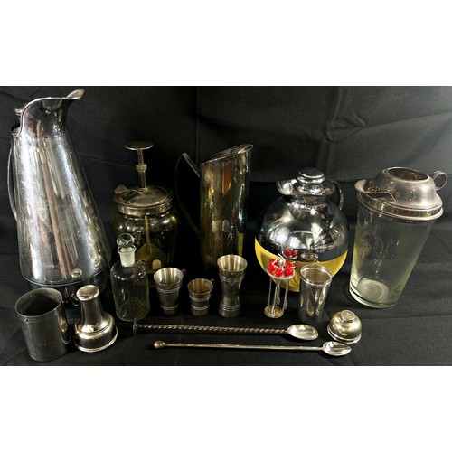 195 - A collection of vintage cocktail and drinks related utensils and flasks, including a Thermos Model 7... 