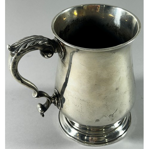 212 - A George III silver tankard, (with later inscription), with a scrolled handle, London, 1776, makers ... 