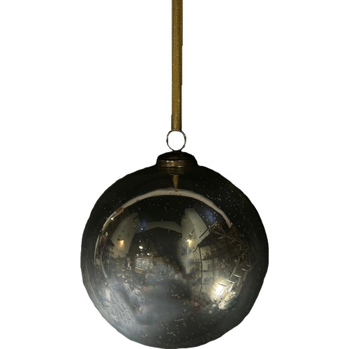 167 - A Silver witches ball / a large Christmas bauble with snow flake decoration, 18cm diam approximately