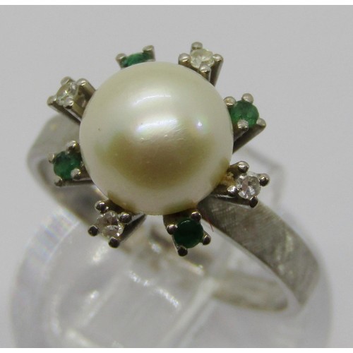 237 - Vintage white metal pearl, emerald and diamond cluster ring, the outer shank with textured finish, s... 