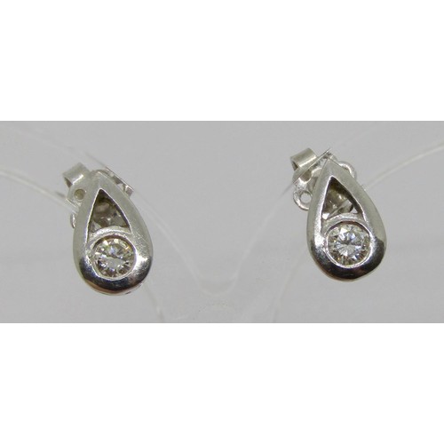 242 - Pair of 18ct white gold diamond stud earrings of pear shape, 0.15ct each approx, maker 'ALd', 2.3g