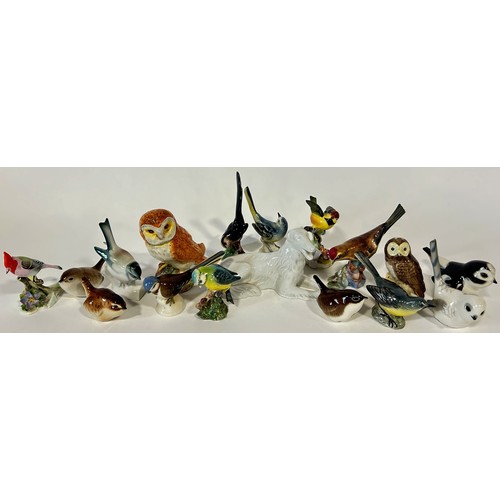 23 - A collection of birds, examples by Beswick, Spode, Royal Adderley etc (17)