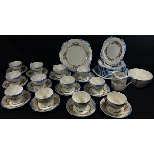 62 - A Heathcote china - The Downs pattern tea set for 12, with cups, saucers, tea plates, two sandwich p... 