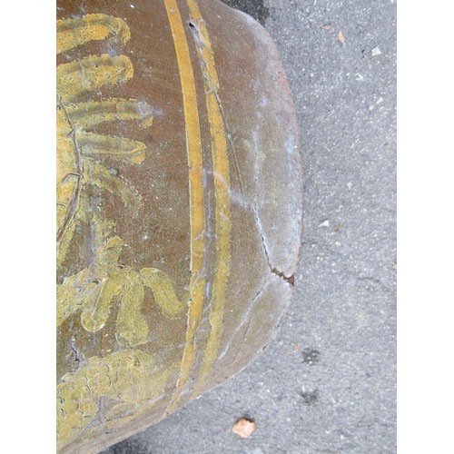 1032 - A large matt glazed terracotta planter of circular tapered ribbed for 44cm high x 100cm diameter, to... 