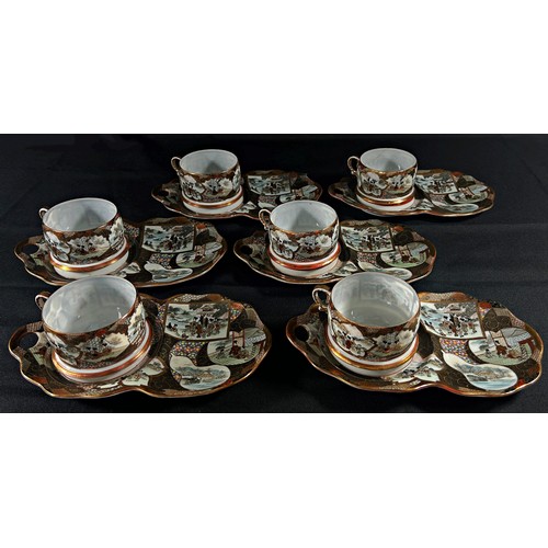 82 - A Japanese export Satsuma porcelain tea service comprising teapot, twin-handled sugar basin and milk... 