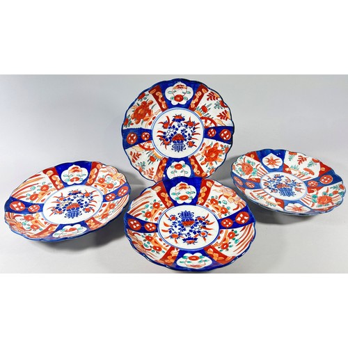 77 - A group of 19th century and later Japanese Imari pattern dishes (7).