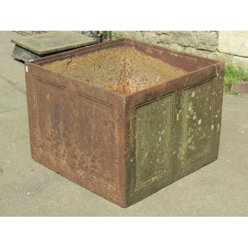 1053 - A weathered 19th century cast iron strong box with panelled frame (lacks lid), 47 cm high x 61 cm sq... 