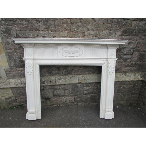 1080 - An antique Georgian style painted pine fire surround/chimney piece with classical detail, 132 cm hig... 