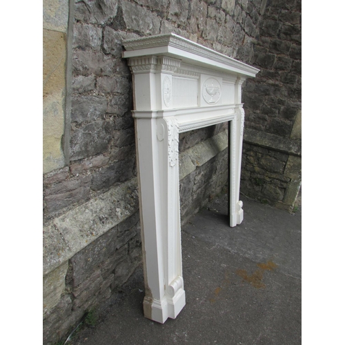 1080 - An antique Georgian style painted pine fire surround/chimney piece with classical detail, 132 cm hig... 