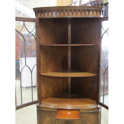 1085 - A good quality reproduction floor standing bow fronted corner display cabinet enclosed by four doors... 