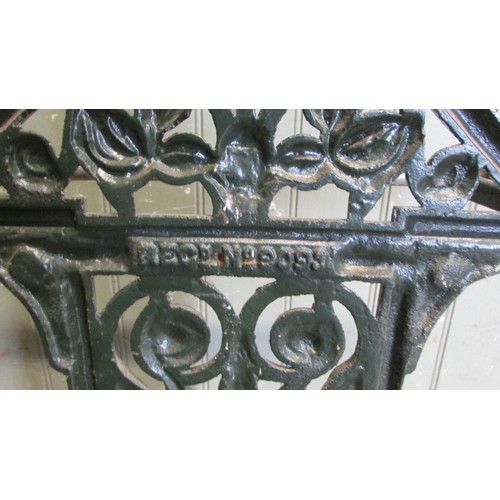 1061 - A Victorian cast iron umbrella/stick stand with decorative pierced and scrolling foliate, urn and ot... 