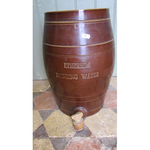 1047 - A glazed and banded stone ware Etherium drinking water barrel, complete with cap and tap, 42cm high