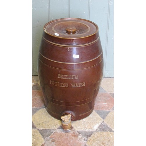 1047 - A glazed and banded stone ware Etherium drinking water barrel, complete with cap and tap, 42cm high