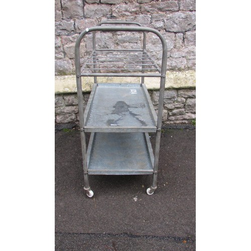 1083 - An industrial galvanised and tubular steel framed three tier trolley, 88cm (full height( x 80cm x 40... 