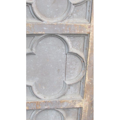 1079 - A pair of antique pine quarter panels with Gothic tracery quatrefoil detail, 142cm high x 41cm wide