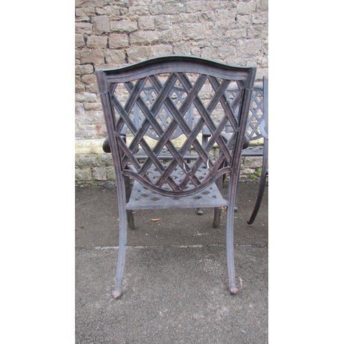 1008 - A set of four contemporary lattice back garden elbow chairs (capable of stacking)