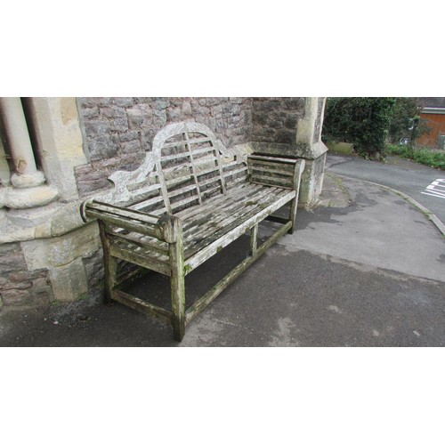 1017 - A weathered teak Lutyens bench 197cm (af)