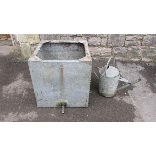 1015 - A square galvanised steel water tank with pop rivetted seems, 52cm square, together with a watering ... 