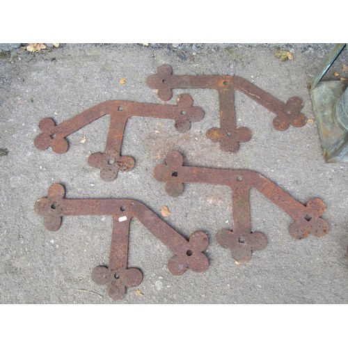 1090 - Four antique Gothic architectural brackets, a weathered copper heater and steel yard arm, etc