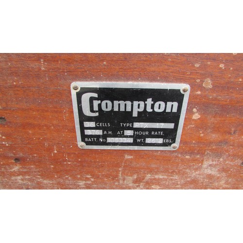 1126 - A teak and steel banded trunk with applied label Crompton, with plywood lid, together with a small t... 