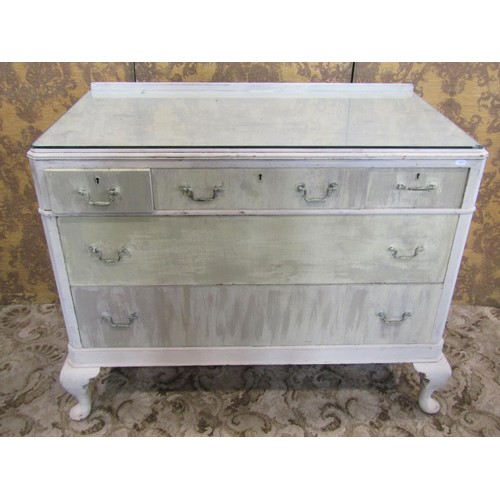 1150 - A bedroom chest in the Georgian style fitted with three short and two long drawers on cabriole suppo... 