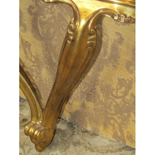 1151 - A small gilt wood console table, the serpentine front fitted with a frieze drawer, raised on shaped ... 