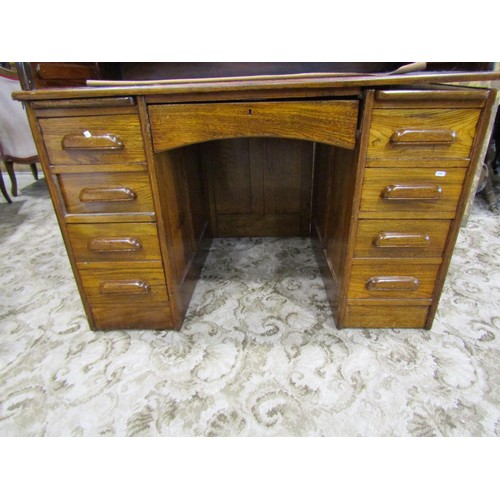 1158 - A oak roll kneehole twin pedestal desk, with S shaped tambour roll, 118cm high x 122cm wide x 79cm d... 