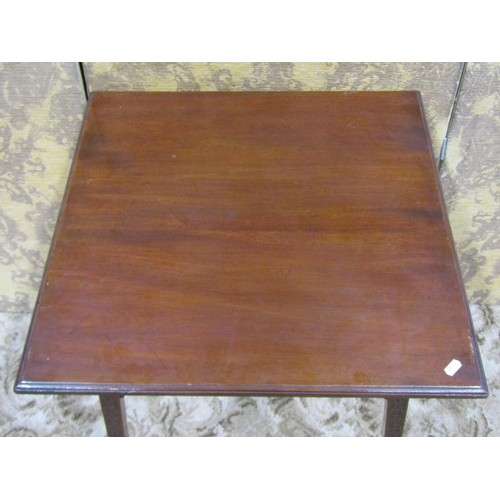 1166 - An Edwardian mahogany occasional table raised on square tapered supports with blind fret detail, 67c... 