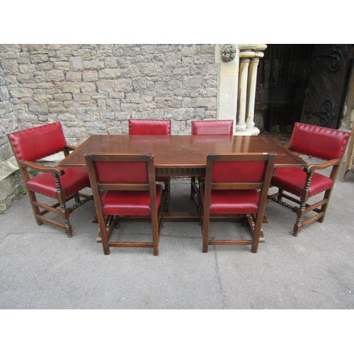 1173 - A reproduction Old English style oak refectory table by Bevan Funnell, raised on cup and cover balus... 