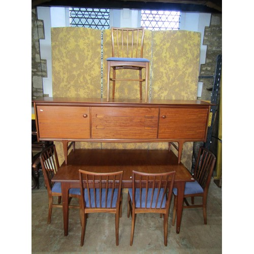 1153 - An A Younger Ltd mid-20th century teak dining room suite comprising a long sideboard, 75cm high x 21... 