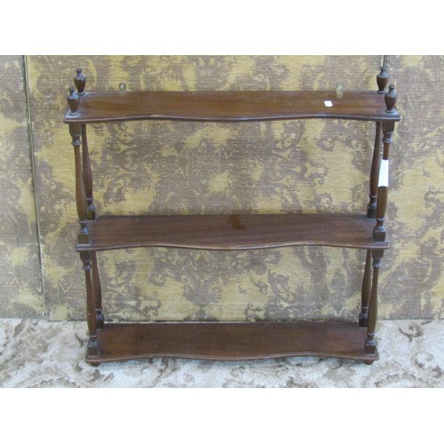 1157 - A Victorian mahogany toilet mirror, together with a four tier graduated watnot with inlaid detail, a... 