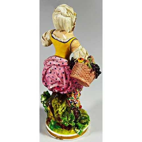 95 - A Bloor Derby figure of a young woman, polychrome decorated, modelled  carrying a basket of fruit, a... 