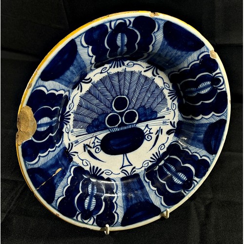 101 - An 18th century Delft plate, marked to underside, 24cm diameter, together with a small 19th century ... 